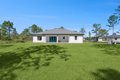 Where Luxury Meets Comfort -- Your Dream Home Awaits on a Full on Wedgefield Golf Club in Florida - for sale on GolfHomes.com, golf home, golf lot