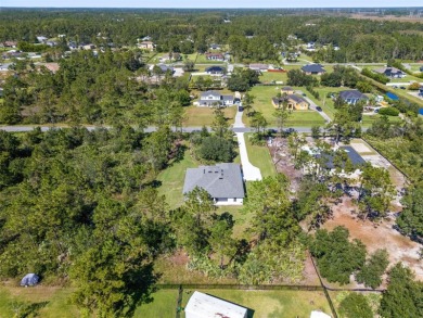 Where Luxury Meets Comfort -- Your Dream Home Awaits on a Full on Wedgefield Golf Club in Florida - for sale on GolfHomes.com, golf home, golf lot