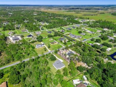 Where Luxury Meets Comfort -- Your Dream Home Awaits on a Full on Wedgefield Golf Club in Florida - for sale on GolfHomes.com, golf home, golf lot