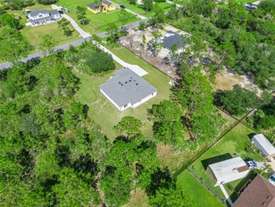 Where Luxury Meets Comfort -- Your Dream Home Awaits on a Full on Wedgefield Golf Club in Florida - for sale on GolfHomes.com, golf home, golf lot