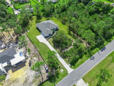 Where Luxury Meets Comfort -- Your Dream Home Awaits on a Full on Wedgefield Golf Club in Florida - for sale on GolfHomes.com, golf home, golf lot