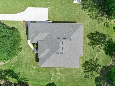 Where Luxury Meets Comfort -- Your Dream Home Awaits on a Full on Wedgefield Golf Club in Florida - for sale on GolfHomes.com, golf home, golf lot