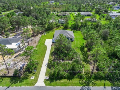 Where Luxury Meets Comfort -- Your Dream Home Awaits on a Full on Wedgefield Golf Club in Florida - for sale on GolfHomes.com, golf home, golf lot
