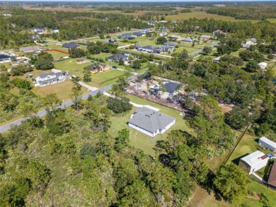 Where Luxury Meets Comfort -- Your Dream Home Awaits on a Full on Wedgefield Golf Club in Florida - for sale on GolfHomes.com, golf home, golf lot