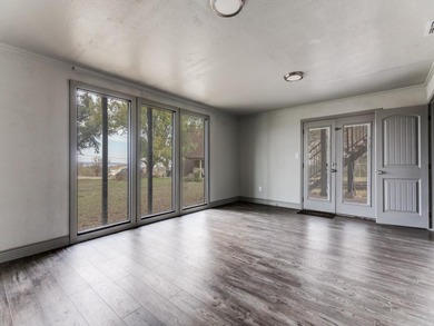 Discover Your Dream Lake House with Spectacular Sunset Views! on The Club At Runaway Bay in Texas - for sale on GolfHomes.com, golf home, golf lot