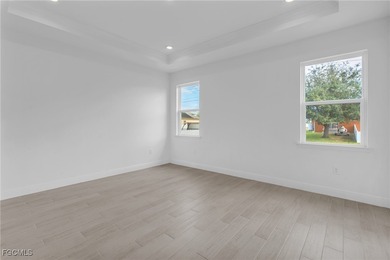 Experience modern Florida living in this beautifully designed on Burnt Store Golf Club in Florida - for sale on GolfHomes.com, golf home, golf lot