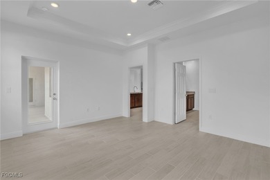 Experience modern Florida living in this beautifully designed on Burnt Store Golf Club in Florida - for sale on GolfHomes.com, golf home, golf lot