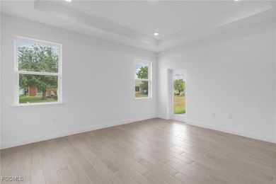 Experience modern Florida living in this beautifully designed on Burnt Store Golf Club in Florida - for sale on GolfHomes.com, golf home, golf lot