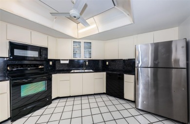 Top-Floor Condo with Panoramic Island Views! Experience the best on Isla Del Sol Yacht and Country Club in Florida - for sale on GolfHomes.com, golf home, golf lot