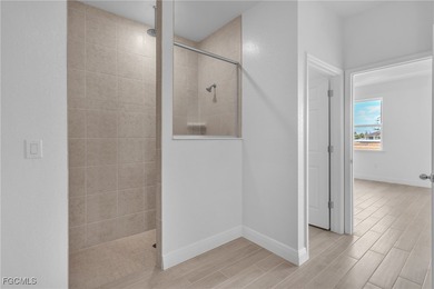 Experience modern Florida living in this beautifully designed on Burnt Store Golf Club in Florida - for sale on GolfHomes.com, golf home, golf lot