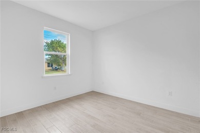 Experience modern Florida living in this beautifully designed on Burnt Store Golf Club in Florida - for sale on GolfHomes.com, golf home, golf lot