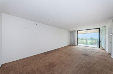 Top-Floor Condo with Panoramic Island Views! Experience the best on Isla Del Sol Yacht and Country Club in Florida - for sale on GolfHomes.com, golf home, golf lot