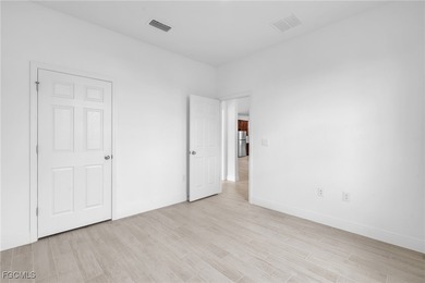 Experience modern Florida living in this beautifully designed on Burnt Store Golf Club in Florida - for sale on GolfHomes.com, golf home, golf lot