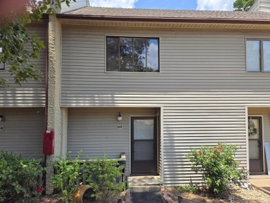 Lovely two-bedroom Condo with brand new carpet upstairs and new on Indian Hills Country Club in Arkansas - for sale on GolfHomes.com, golf home, golf lot