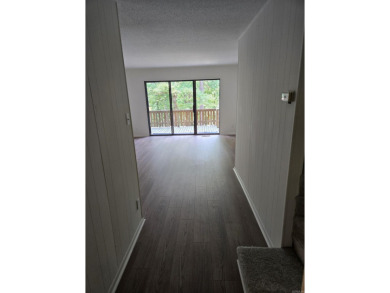 Lovely two-bedroom Condo with brand new carpet upstairs and new on Indian Hills Country Club in Arkansas - for sale on GolfHomes.com, golf home, golf lot
