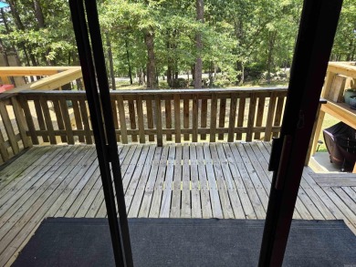 Lovely two-bedroom Condo with brand new carpet upstairs and new on Indian Hills Country Club in Arkansas - for sale on GolfHomes.com, golf home, golf lot