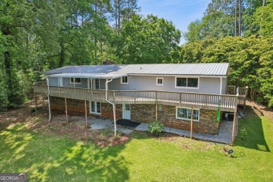 Beautiful main lake views from this meticulously maintained 4 on Turtle Cove Golf Course in Georgia - for sale on GolfHomes.com, golf home, golf lot