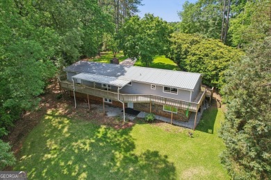 Beautiful main lake views from this meticulously maintained 4 on Turtle Cove Golf Course in Georgia - for sale on GolfHomes.com, golf home, golf lot