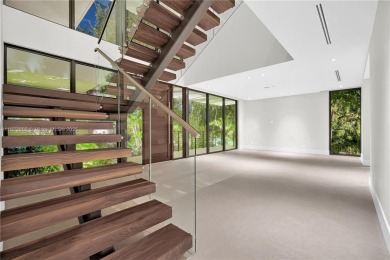 Experience Modern Elegance on the exclusive island of Key on Crandon Golf At Key Biscayne in Florida - for sale on GolfHomes.com, golf home, golf lot