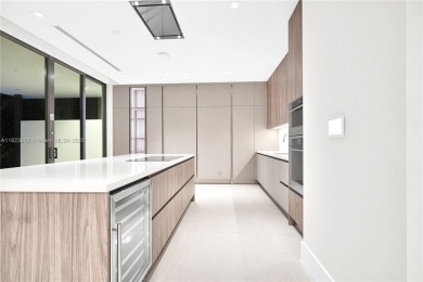 Experience Modern Elegance on the exclusive island of Key on Crandon Golf At Key Biscayne in Florida - for sale on GolfHomes.com, golf home, golf lot