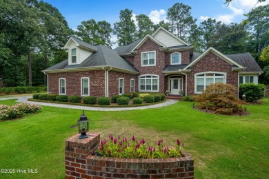 Welcome to 704 Squire Lane, where timeless elegance meets modern on Porters Neck Country Club in North Carolina - for sale on GolfHomes.com, golf home, golf lot