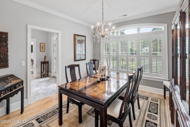 Welcome to 704 Squire Lane, where timeless elegance meets modern on Porters Neck Country Club in North Carolina - for sale on GolfHomes.com, golf home, golf lot