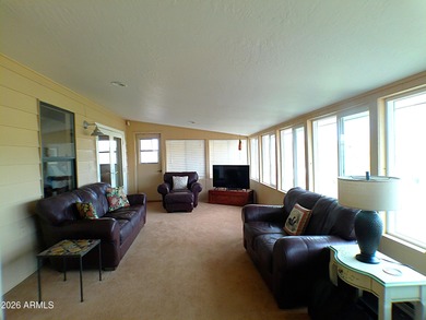 Looking for a home offering dark skies, quiet evenings, and on Queen Valley Golf Course in Arizona - for sale on GolfHomes.com, golf home, golf lot