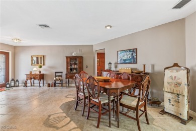 Beautifully maintained 4 bedroom 2.5 bathroom pool home on an on Royal Palm Golf Club in Florida - for sale on GolfHomes.com, golf home, golf lot