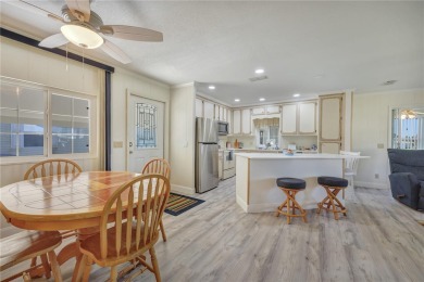 FANTASTIC PRICE REDUCTION for golf course views overlooking the on Maple Leaf Golf and Country Club in Florida - for sale on GolfHomes.com, golf home, golf lot