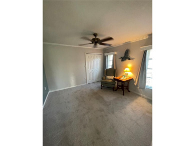 ESCAPE TO YOUR WATERFRONT DREAM HOME IN PUNTA GORDA ISLES! This on Saint Andrews South Golf Club in Florida - for sale on GolfHomes.com, golf home, golf lot