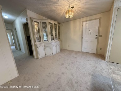 Picture this, a clean move in ready home tucked away in the on High Point Golf Club, Inc. in Florida - for sale on GolfHomes.com, golf home, golf lot