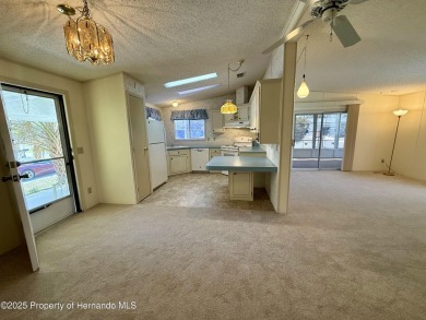 Picture this, a clean move in ready home tucked away in the on High Point Golf Club, Inc. in Florida - for sale on GolfHomes.com, golf home, golf lot