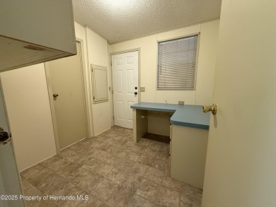 Picture this, a clean move in ready home tucked away in the on High Point Golf Club, Inc. in Florida - for sale on GolfHomes.com, golf home, golf lot