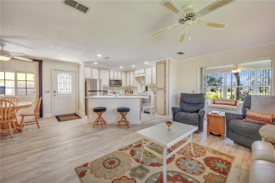 FANTASTIC PRICE REDUCTION for golf course views overlooking the on Maple Leaf Golf and Country Club in Florida - for sale on GolfHomes.com, golf home, golf lot