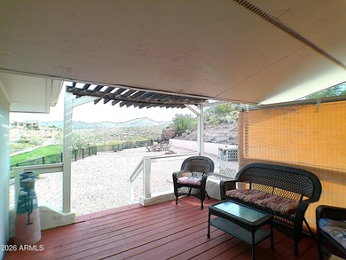 Looking for a home offering dark skies, quiet evenings, and on Queen Valley Golf Course in Arizona - for sale on GolfHomes.com, golf home, golf lot