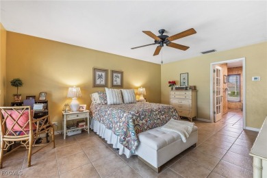 Beautifully maintained 4 bedroom 2.5 bathroom pool home on an on Royal Palm Golf Club in Florida - for sale on GolfHomes.com, golf home, golf lot
