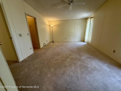 Picture this, a clean move in ready home tucked away in the on High Point Golf Club, Inc. in Florida - for sale on GolfHomes.com, golf home, golf lot