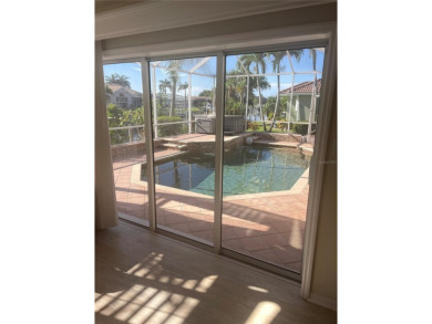 ESCAPE TO YOUR WATERFRONT DREAM HOME IN PUNTA GORDA ISLES! This on Saint Andrews South Golf Club in Florida - for sale on GolfHomes.com, golf home, golf lot