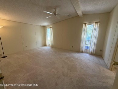 Picture this, a clean move in ready home tucked away in the on High Point Golf Club, Inc. in Florida - for sale on GolfHomes.com, golf home, golf lot