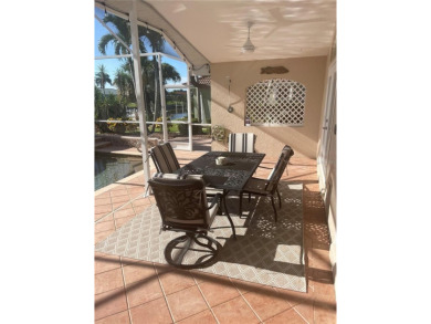 ESCAPE TO YOUR WATERFRONT DREAM HOME IN PUNTA GORDA ISLES! This on Saint Andrews South Golf Club in Florida - for sale on GolfHomes.com, golf home, golf lot