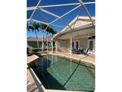 ESCAPE TO YOUR WATERFRONT DREAM HOME IN PUNTA GORDA ISLES! This on Saint Andrews South Golf Club in Florida - for sale on GolfHomes.com, golf home, golf lot