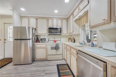 FANTASTIC PRICE REDUCTION for golf course views overlooking the on Maple Leaf Golf and Country Club in Florida - for sale on GolfHomes.com, golf home, golf lot