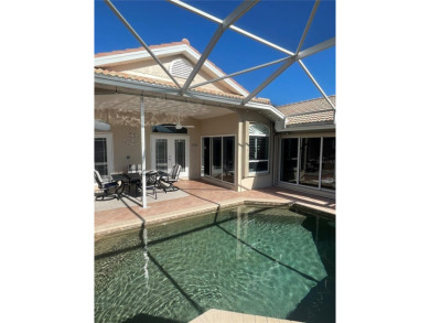 ESCAPE TO YOUR WATERFRONT DREAM HOME IN PUNTA GORDA ISLES! This on Saint Andrews South Golf Club in Florida - for sale on GolfHomes.com, golf home, golf lot