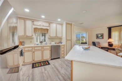 FANTASTIC PRICE REDUCTION for golf course views overlooking the on Maple Leaf Golf and Country Club in Florida - for sale on GolfHomes.com, golf home, golf lot