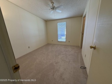 Picture this, a clean move in ready home tucked away in the on High Point Golf Club, Inc. in Florida - for sale on GolfHomes.com, golf home, golf lot