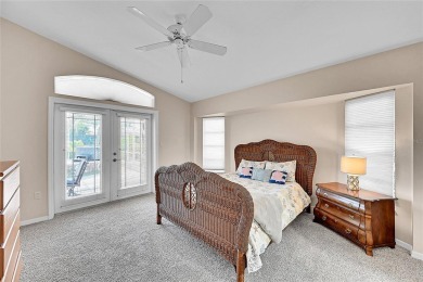 ESCAPE TO YOUR WATERFRONT POOL HOME IN PUNTA GORDA ISLES! This on Saint Andrews South Golf Club in Florida - for sale on GolfHomes.com, golf home, golf lot