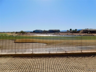 Move in to this new construction home with a beautiful view of on El Rio Golf and Country Club in Arizona - for sale on GolfHomes.com, golf home, golf lot