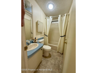 Picture this, a clean move in ready home tucked away in the on High Point Golf Club, Inc. in Florida - for sale on GolfHomes.com, golf home, golf lot
