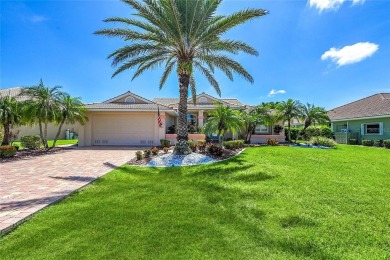 ESCAPE TO YOUR WATERFRONT POOL HOME IN PUNTA GORDA ISLES! This on Saint Andrews South Golf Club in Florida - for sale on GolfHomes.com, golf home, golf lot