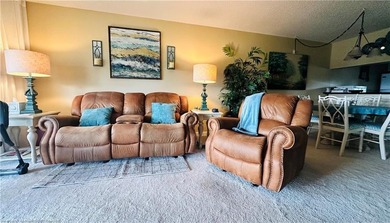 Step into a tastefully, fully furnished 2nd-floor condominium in on Sun n Lake Golf and Country Club in Florida - for sale on GolfHomes.com, golf home, golf lot